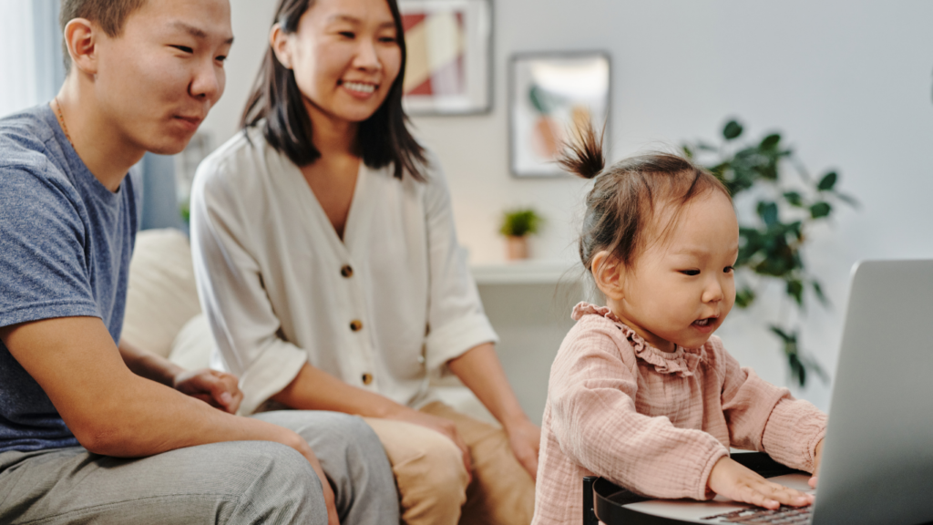 A family sitting on a couch