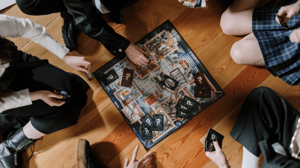 a group of people playing cards