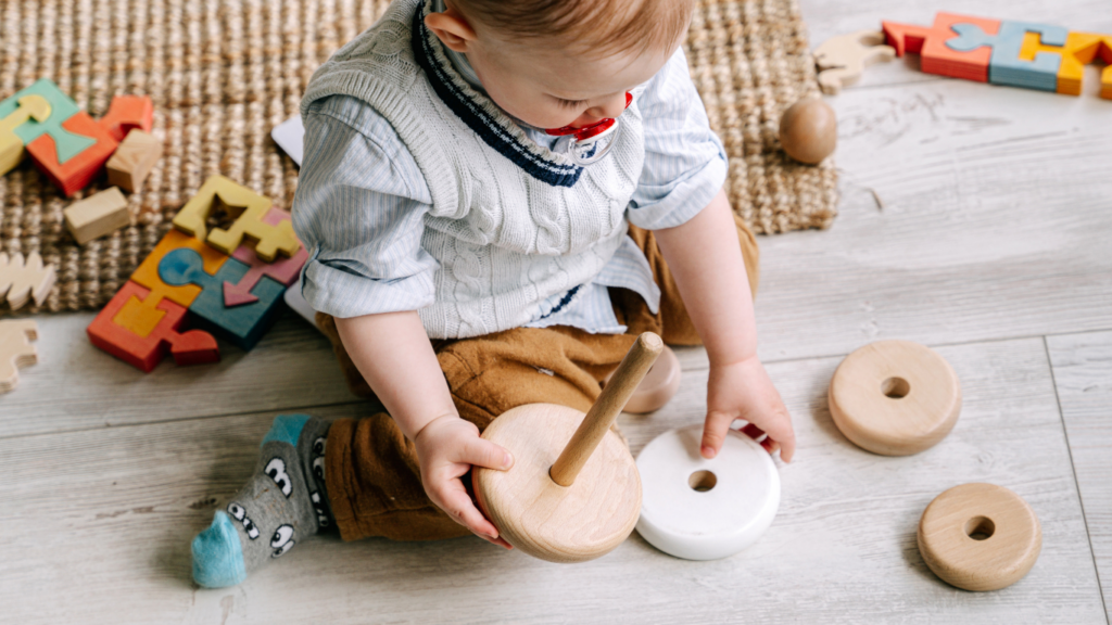 A child playing with wooden blocks