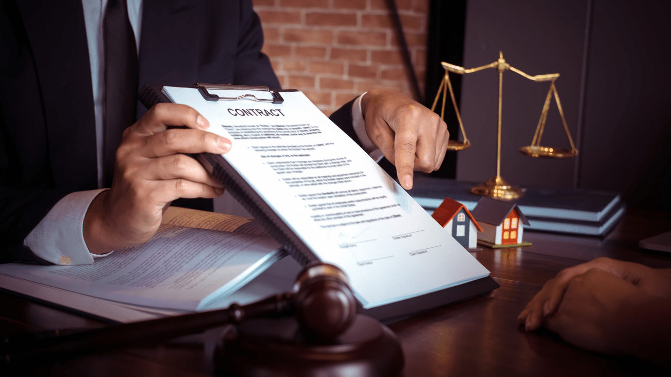 judge's gavel on wooden table in courtroom