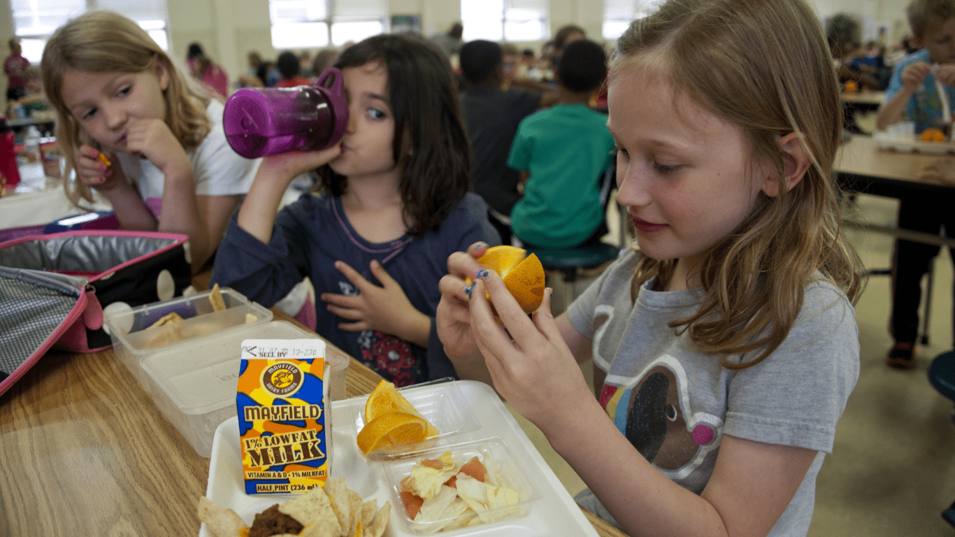 a person eating at the canteen