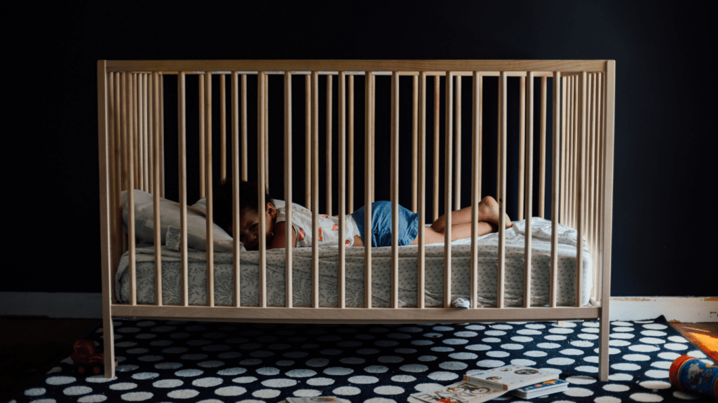 A baby in a crib