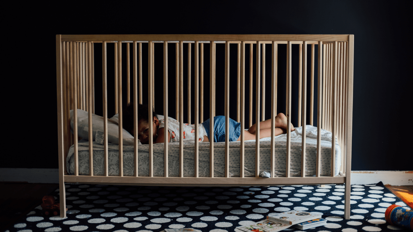 A baby in a crib